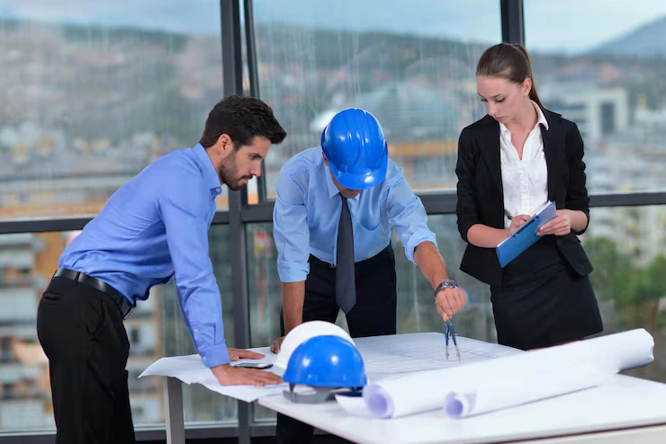 business-people-group-meeting-presentation-bright-modern-office-with-construction-engineer-architect-worker-looking-building-model-blueprint-plans_530697-20085